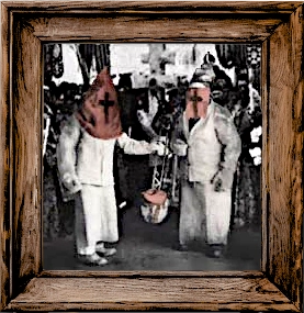 A Framed Photo of some members of the Sect of Valtiel, wearing red, conical hoods.